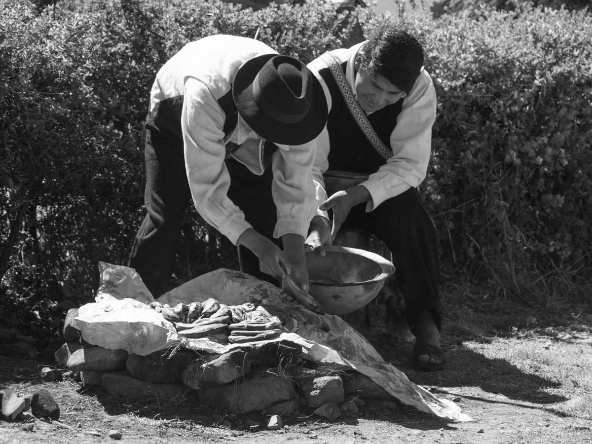 Locals preparing a "pachamama" meal in Santa Maria